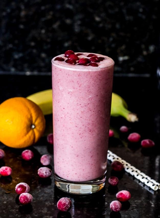 A Clean Eating Cranberry Orange Banana Smoothie that's anti-oxidant rich and loaded with Vitamin C. It's the perfect fall and winter drink that you can enjoy over and over again. Click pin for recipe!
