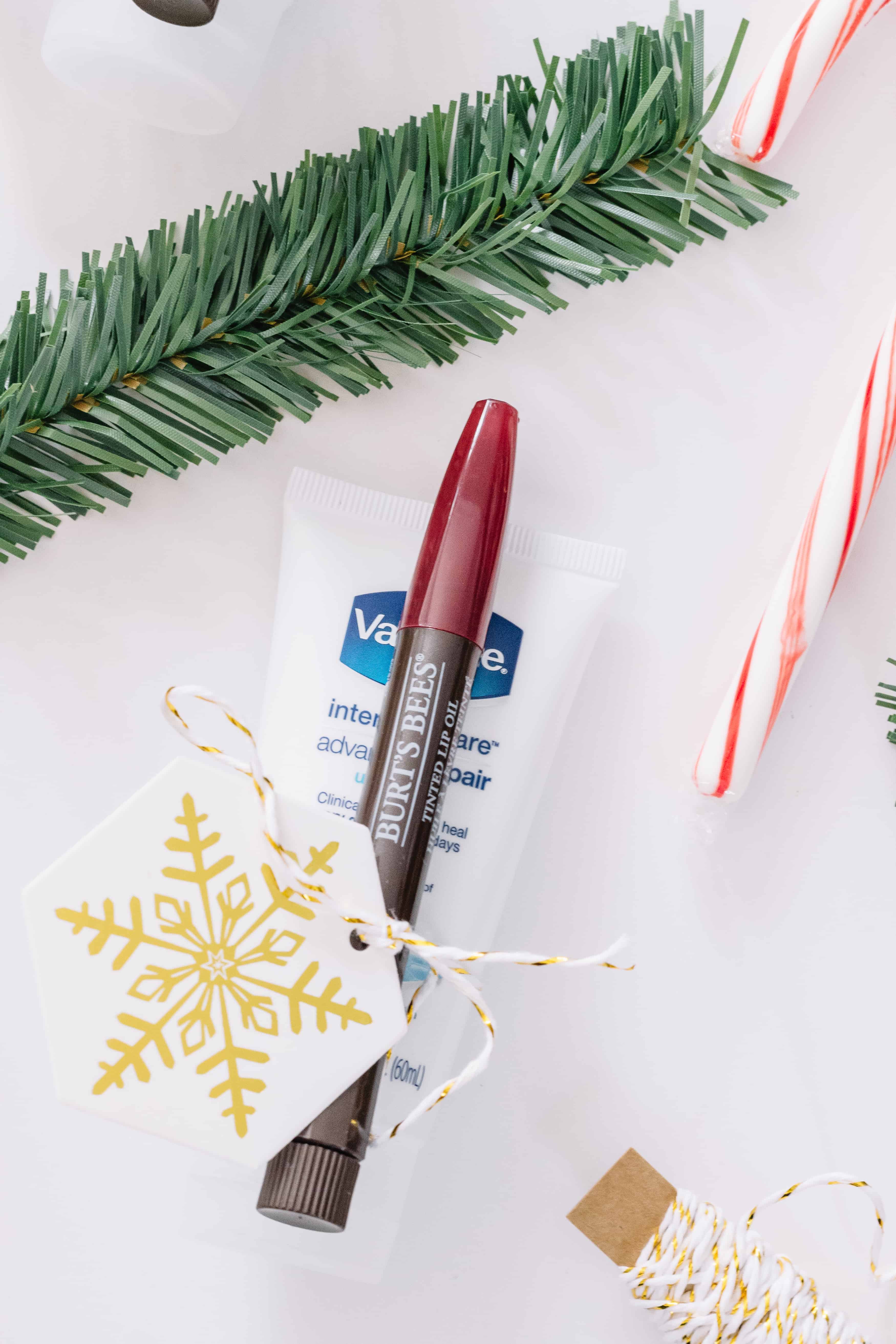 This DIY Lip & Hand Cream Gift Set is The Perfect Winter Duo! I know i would LOVE to receive this as a beauty gift this Christmas! Need a holiday beauty gift for a friend, family member, teacher, stylist, or hostess?! Try this cute gift idea!