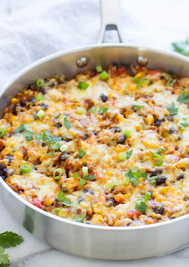These 15 Vegetarian Recipes Are So Satisfying You’ll Want to Go Meatless for an Entire Month! Now I have some healthy veggie recipes to try for breakfast, lunch, and dinner like this One Skillet Mexican Rice Casserole!
