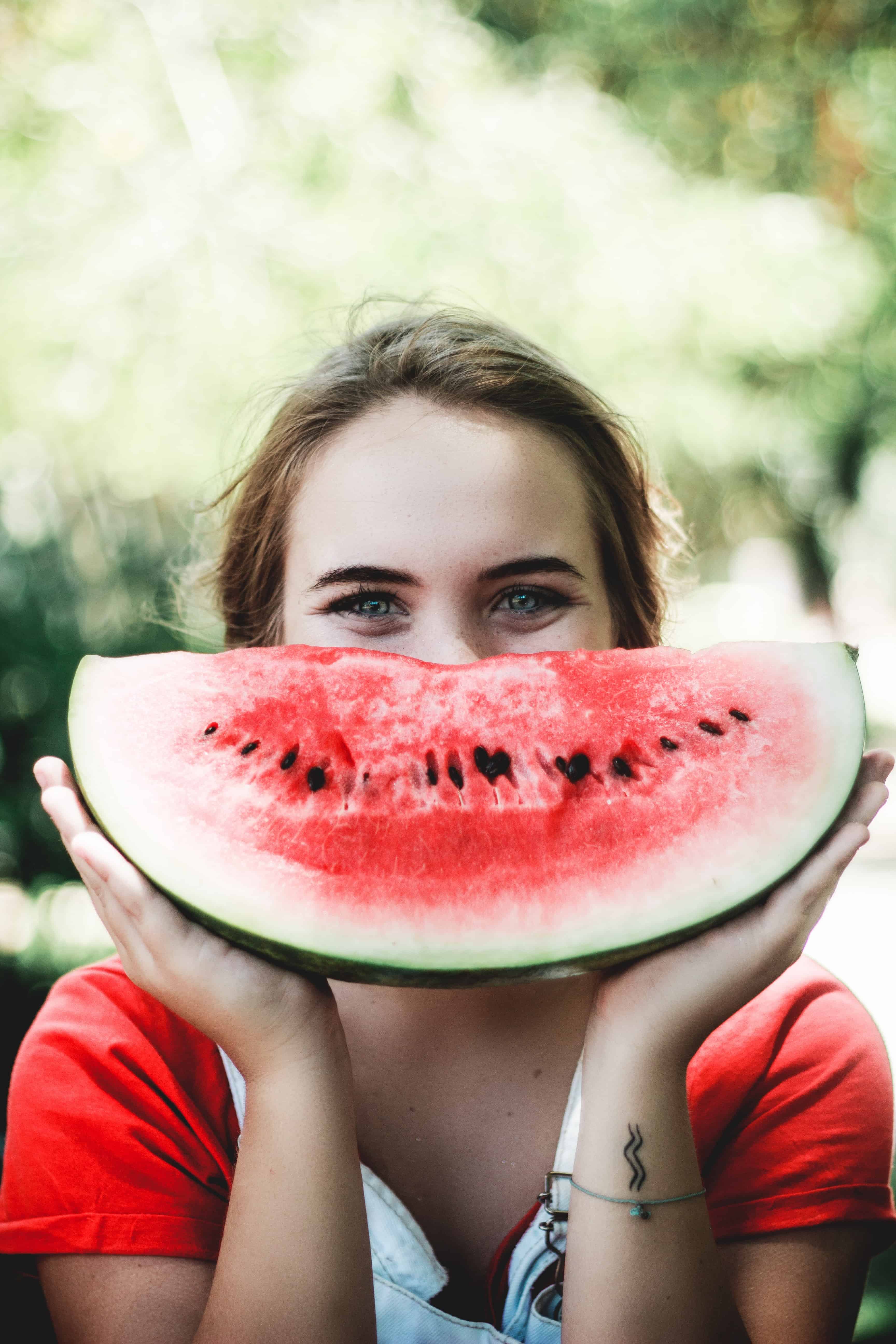 girl smiling with watermelon