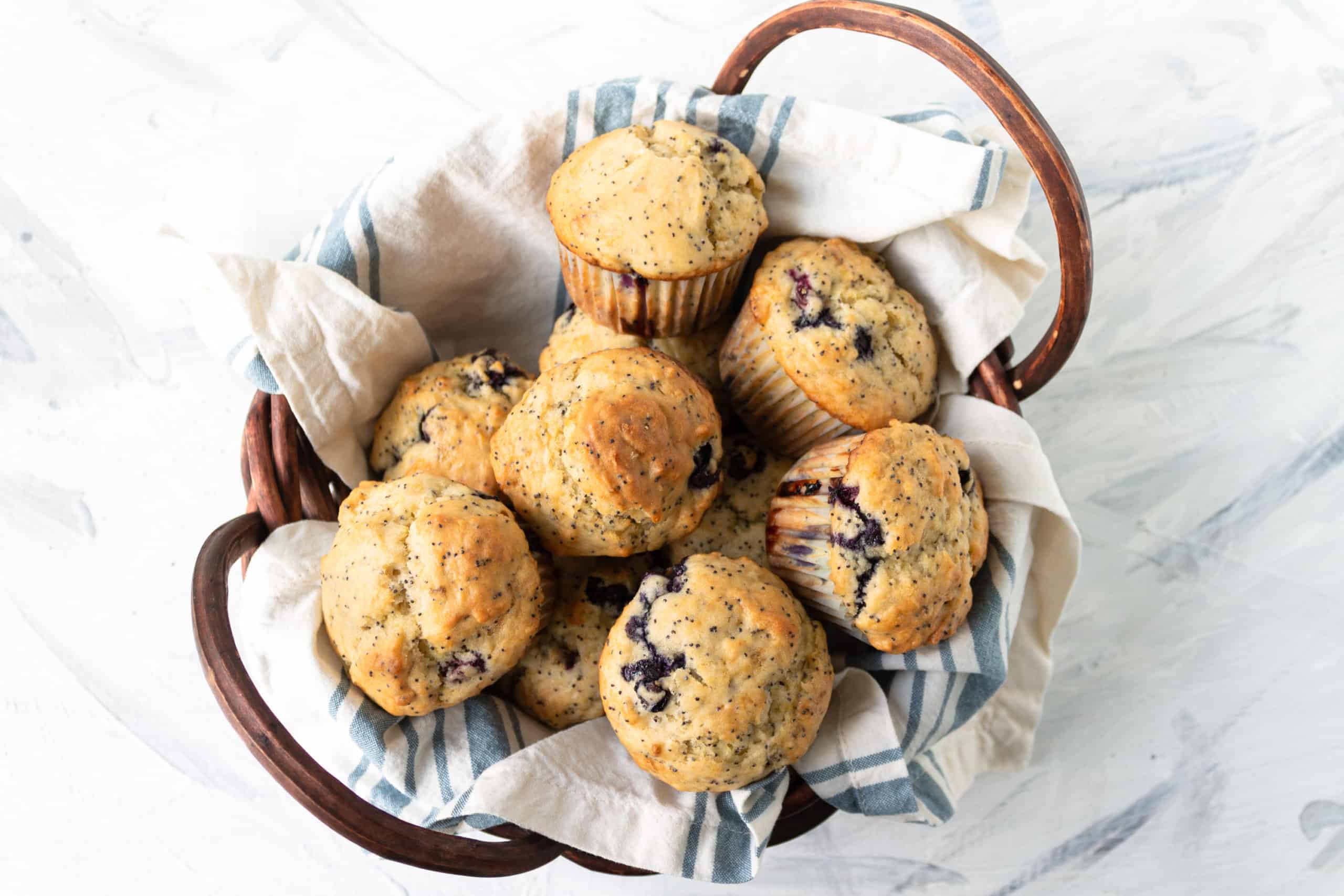 basket full of blueberry Lemon Poppy Seed Muffins
