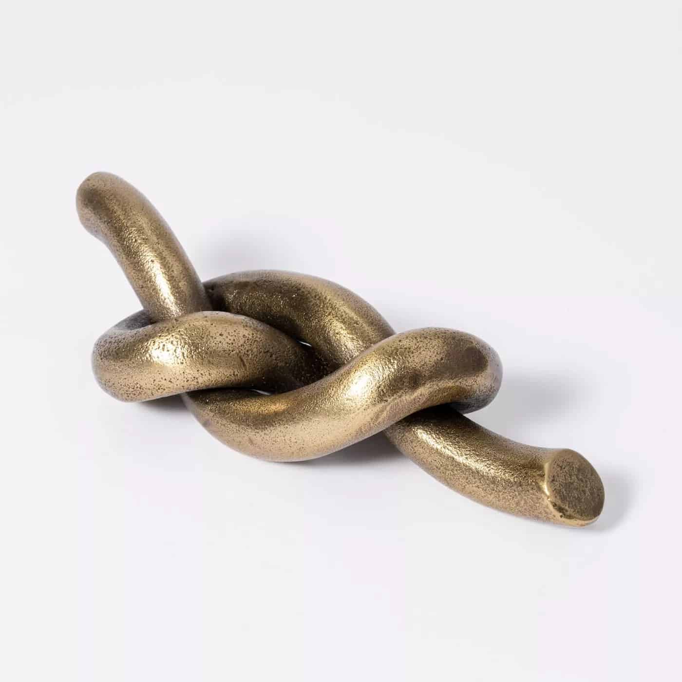 decorative metal knot figurine with cast gold